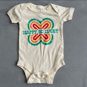 Happy Go Lucky onesie